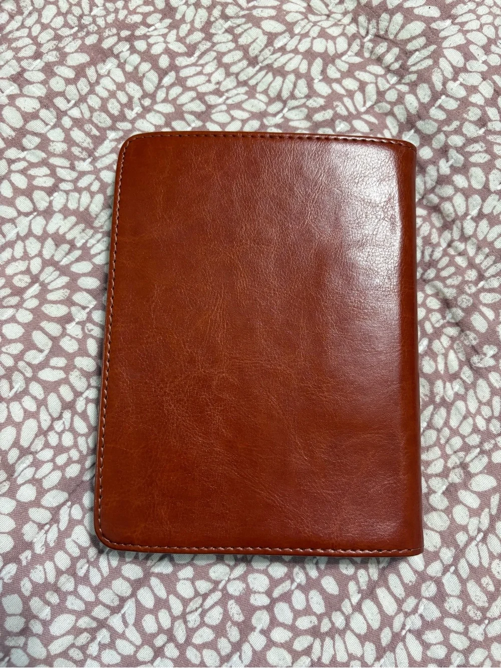 Fintie brand brown vegan leather case designed for the Kindle Paperwhite